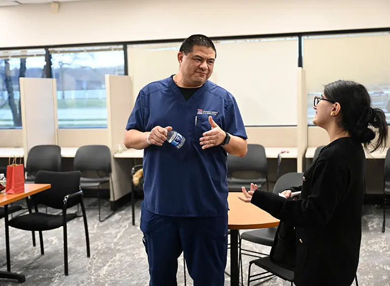 instructor talking to student